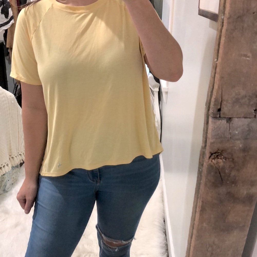 JOYLAB size medium yellow open back athletic top